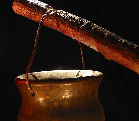 Pot over fire