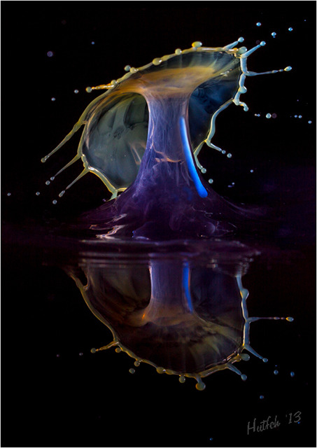Electric Water Drop Collision