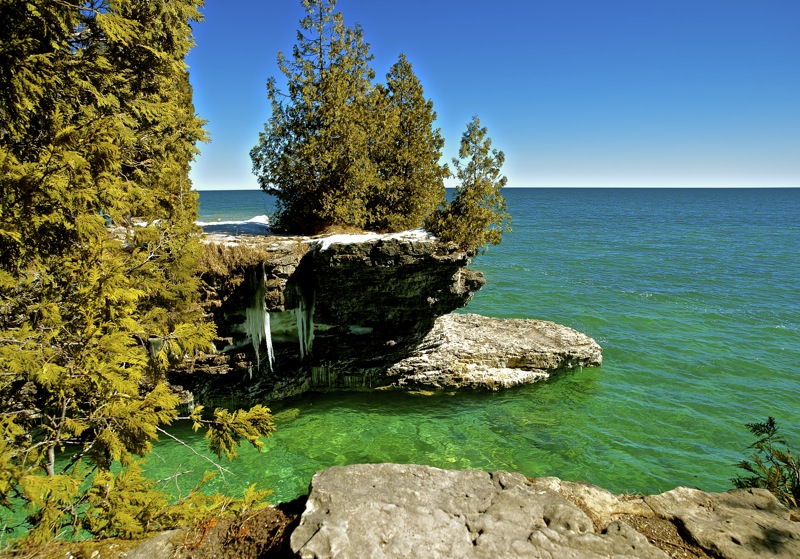 Enjoying the beautiful turquoise Blue of the cold spring waters of Lake Michigan